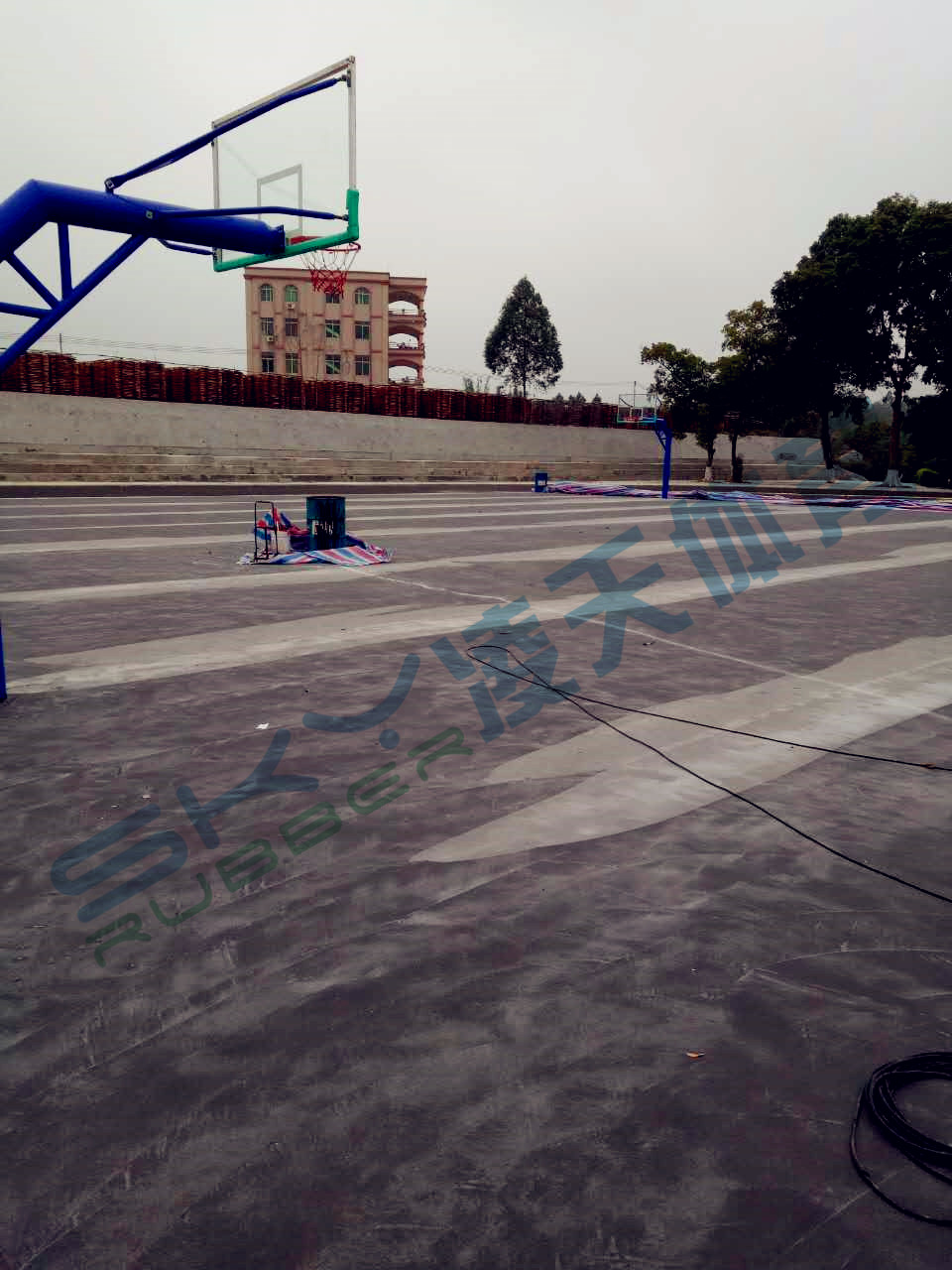 丙烯酸蓝球场案例：江门市鹤山宅梧小学弹性丙